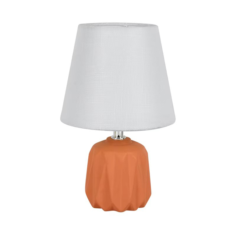 Partihandel modern design keramisk bas orange bordslampa